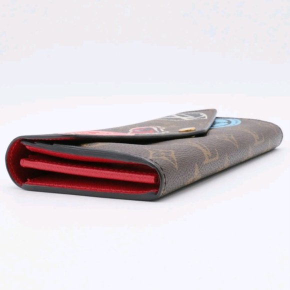 LOUIS VUITTON LIMITED EDITION WORLD TOUR SARAH WALLET NM MONOGRAM CANVAS - Picture 4 of 6